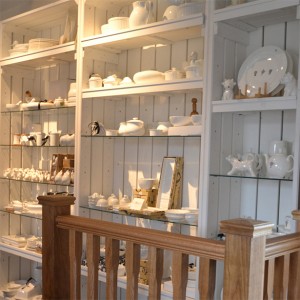 Gift department shelving, white ceramic and homeware displays