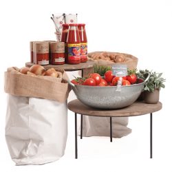 Merchandising-risers-with-white-sacks-Tomatoes-and-onions