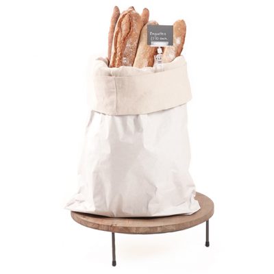 White-sack-with-cotton-lining-on-low-merchandising-riser-Bread-stand