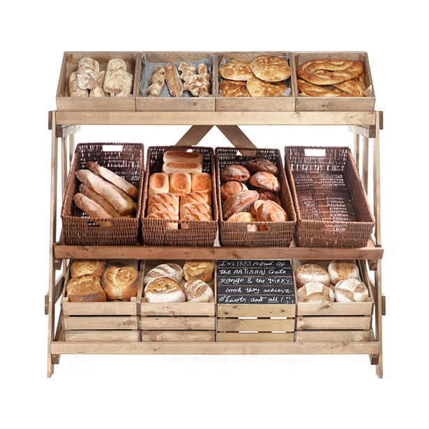 multi tier stand with wicker and wooden crates, bakery display